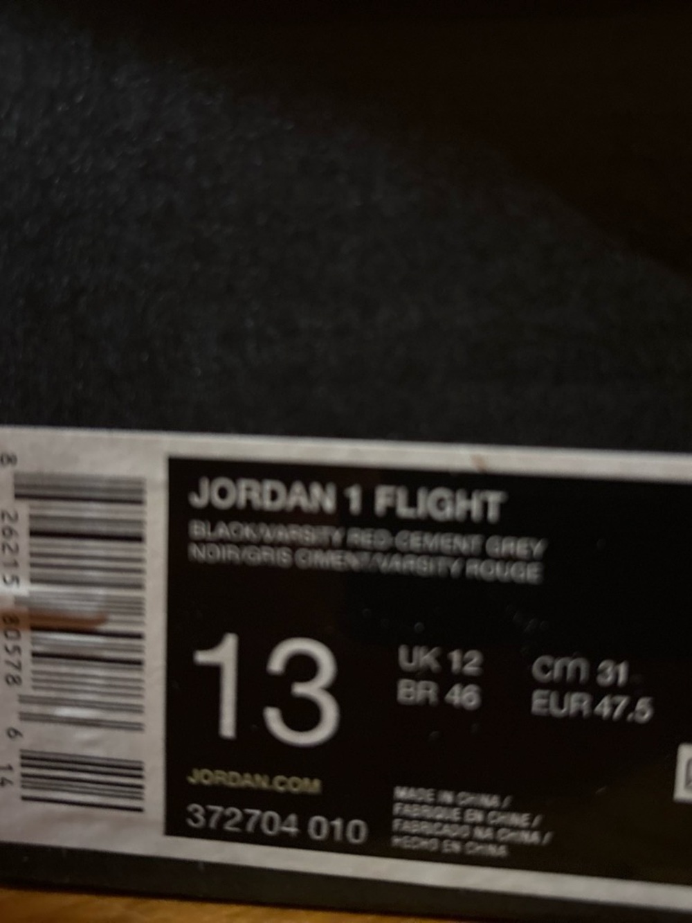 Jordan 1 Flight Black/Varsity Red/Cement Grey Box Label